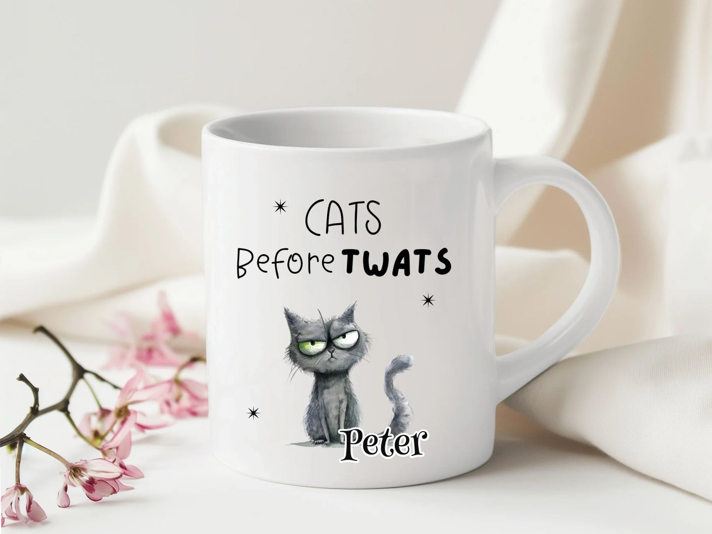 White mug with a cat illustration and text on a light background Customisable cat mug
