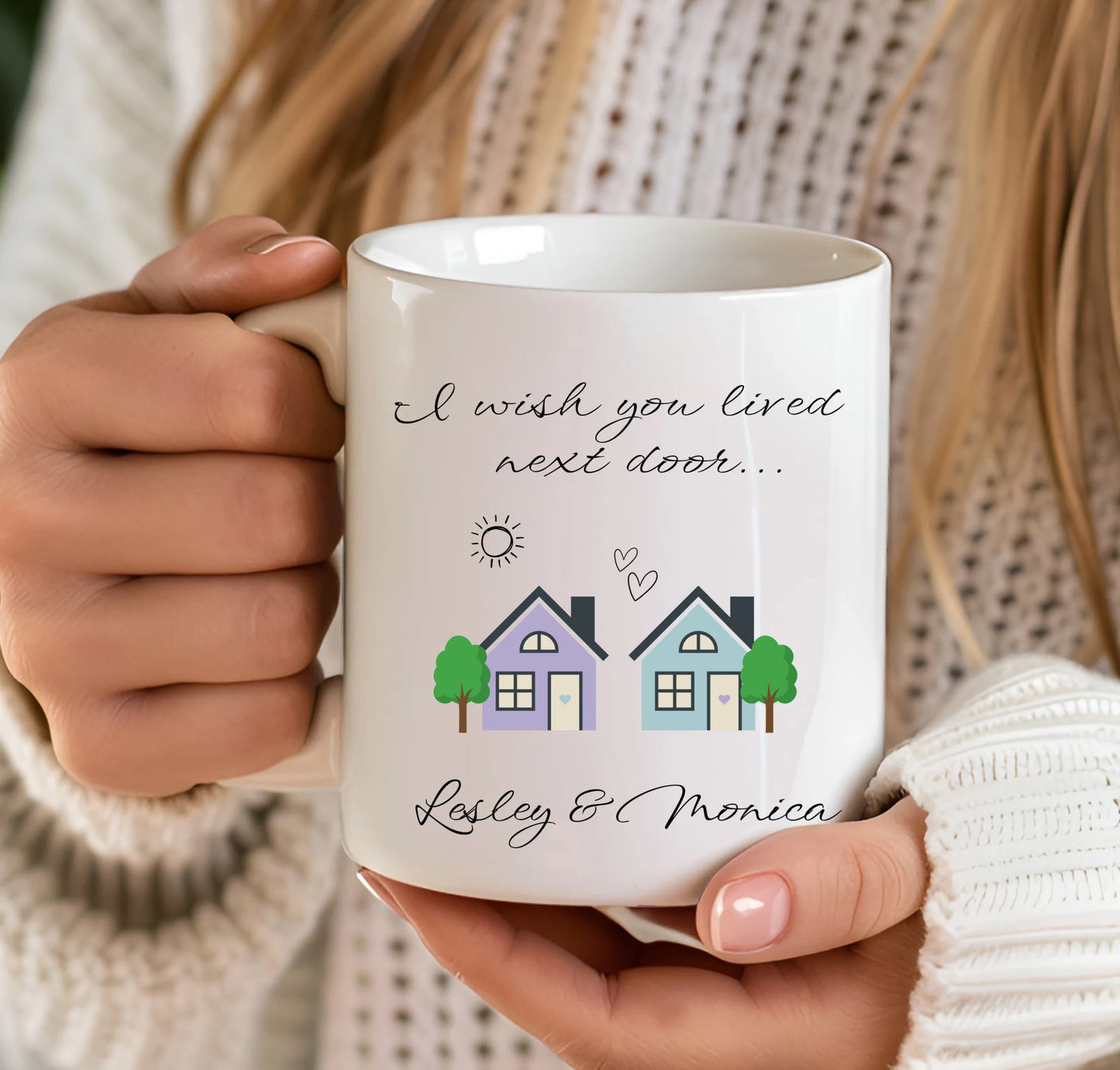 Person holding a mug with a design of houses and text -Cute mug gift for best friend