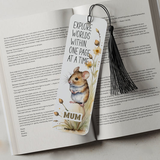White bookmark with a cute field mouse and inspiring reading quote