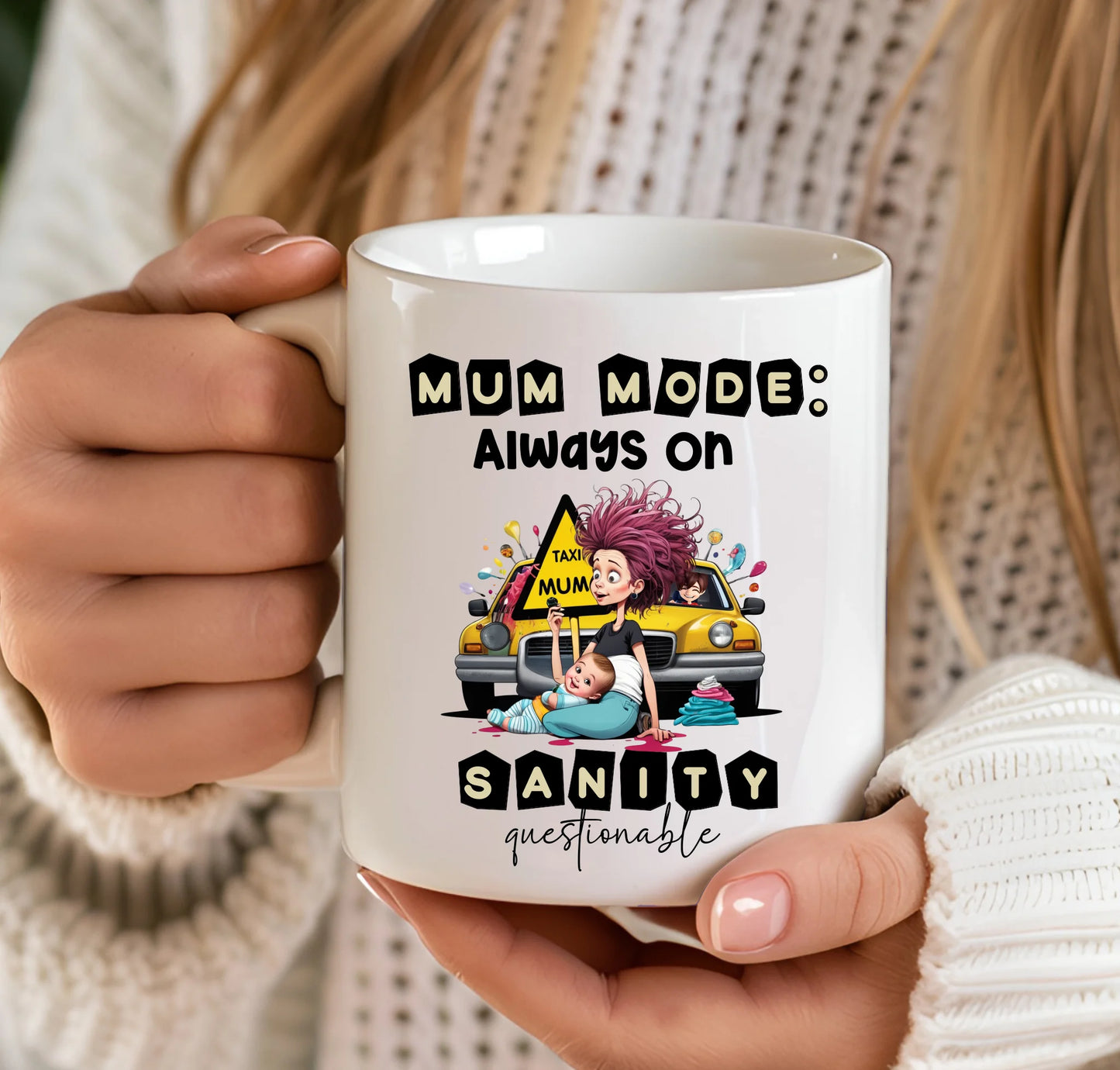 Person holding a mug with a cartoon design and text about 'Mum Mode' and 'Sanity Questionable'.
