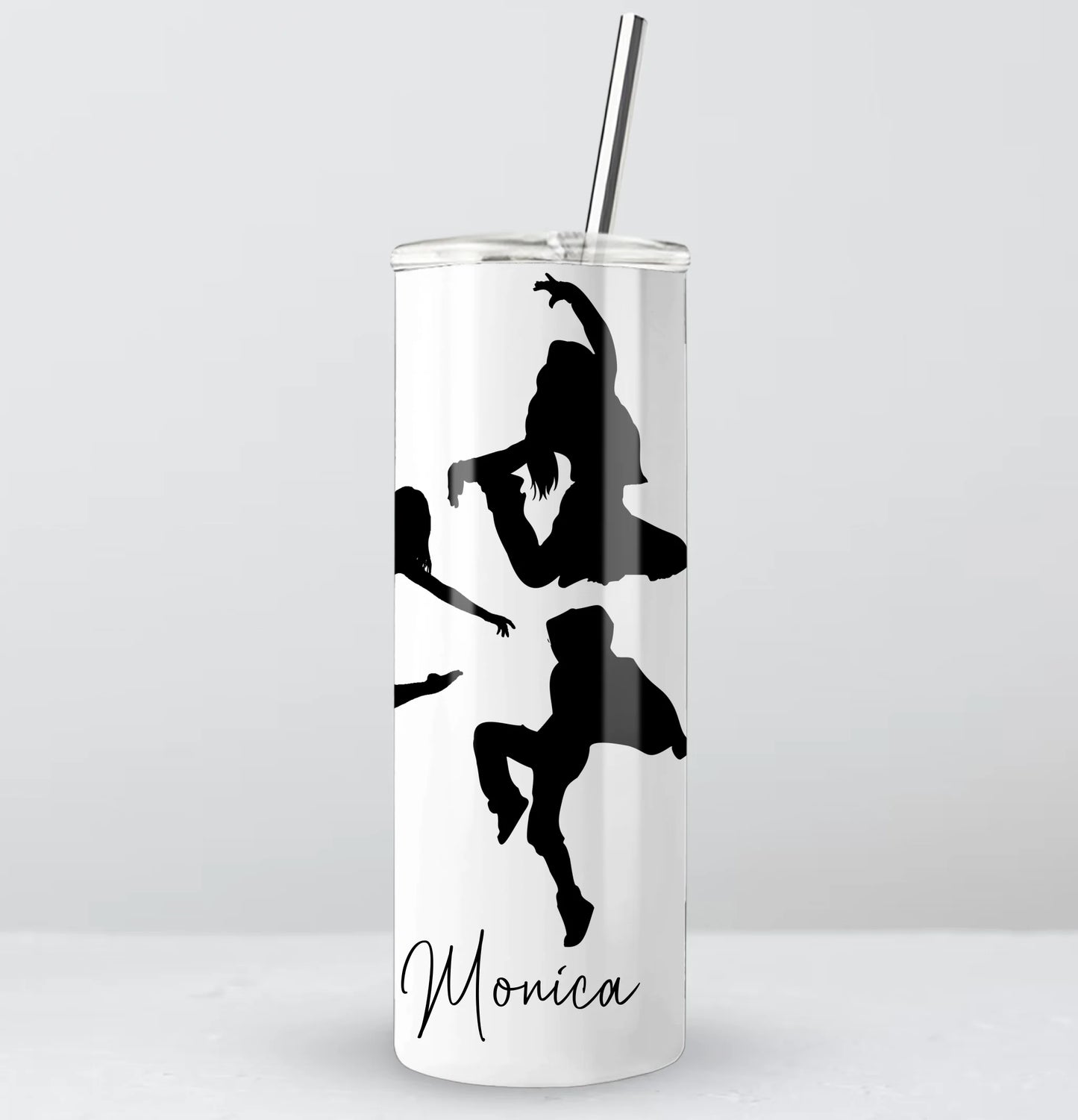 white tumbler with black silhouette design and name 'Monica' on a white background