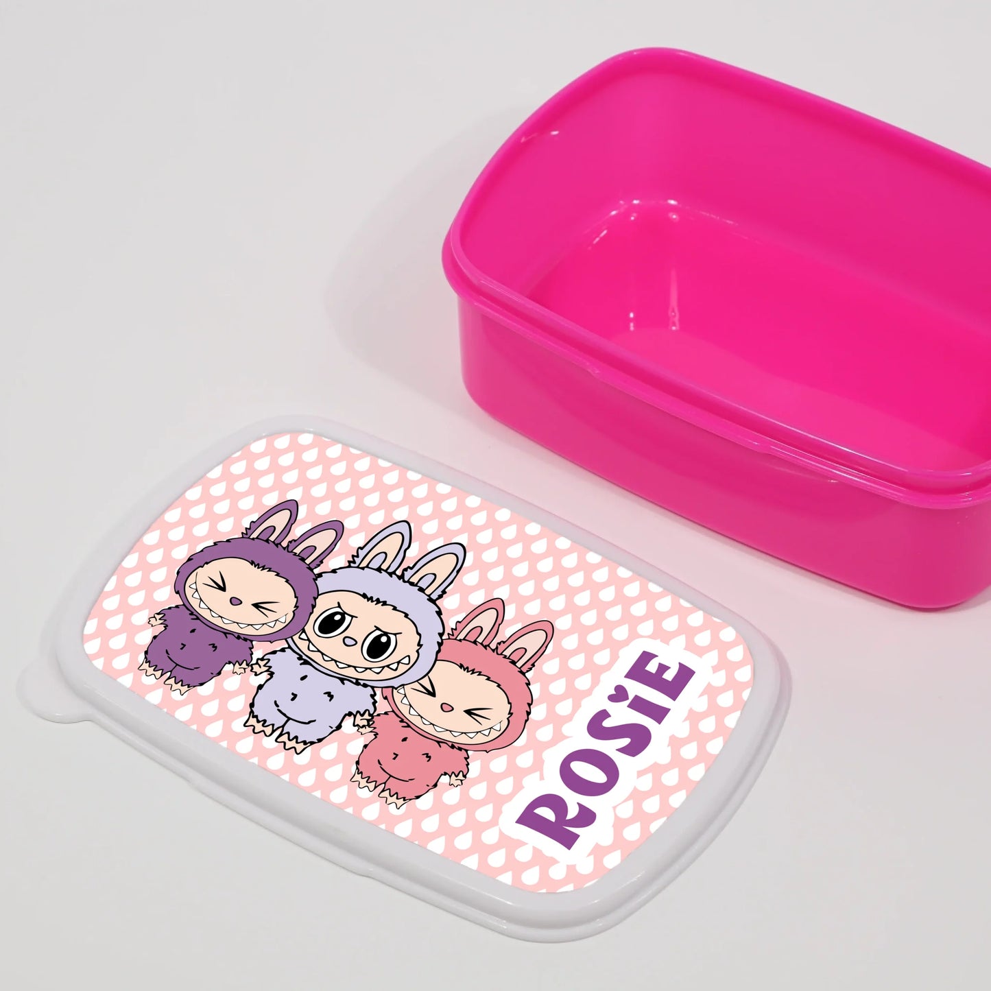 Lunch box with three Labubus