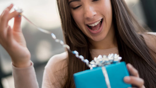Lady unwrapping a gift