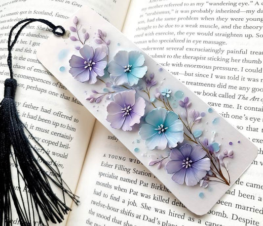 A beautiful Floral Bookmark with stunning purple and blue 3D effect flowers.  A black tassel.