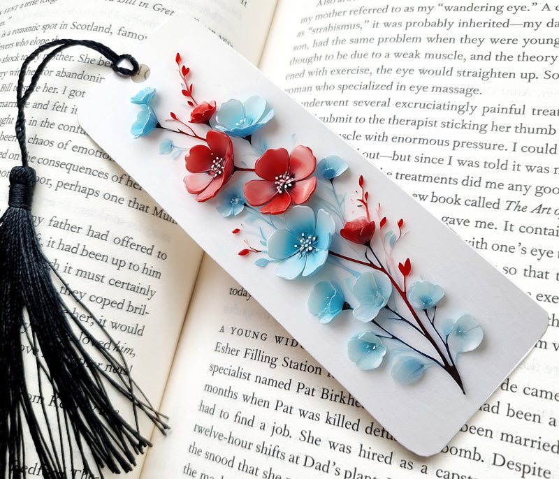 Elegant aluminum bookmark with a lifelike 3D flower design on a page of writing. Beautiful