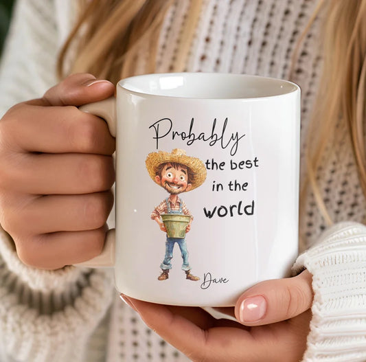 Person holding a mug with a cartoon character and text 'Probably the best in the world Dave'.