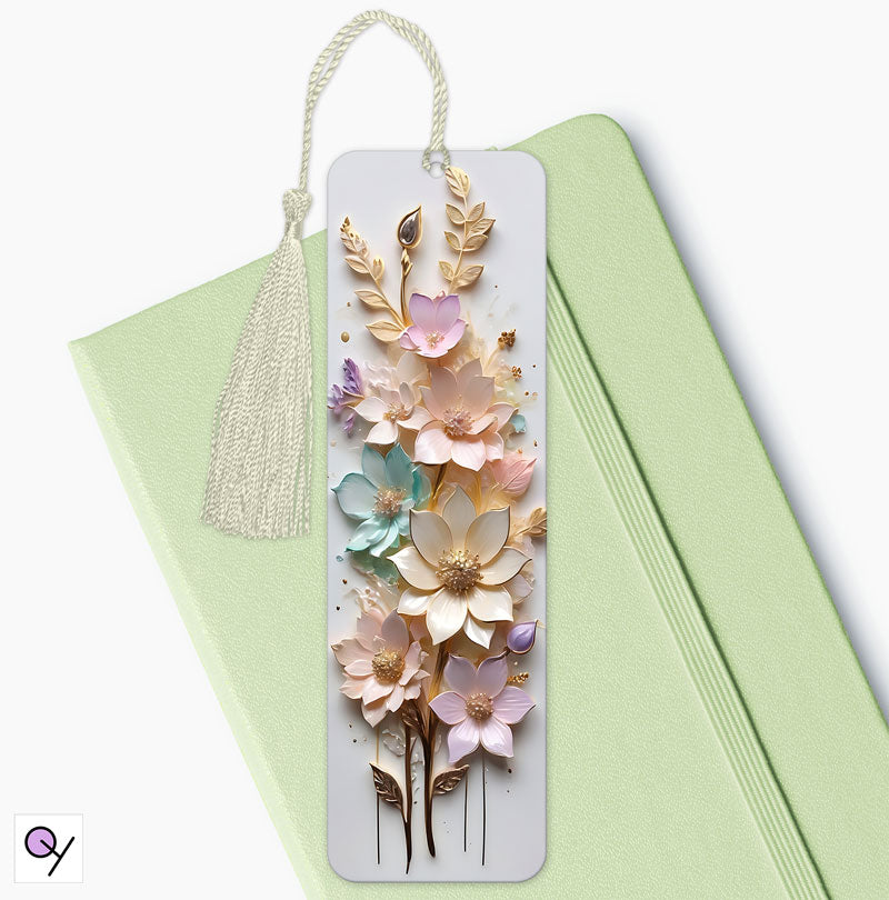 Elegant Pastel Floral Bookmark Present: pastel 3D floral design bookmark made of aluminium measuring 15x4.5cm, ideal present for gifting on any occasion. It has a cream tassel..