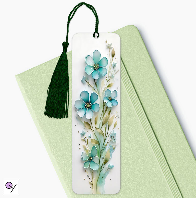 A gift bokmak with flowers on aa white background.  Very Pretty, modern feel, Comes with a tassel,  3D Flower.  Original gift for book lovers