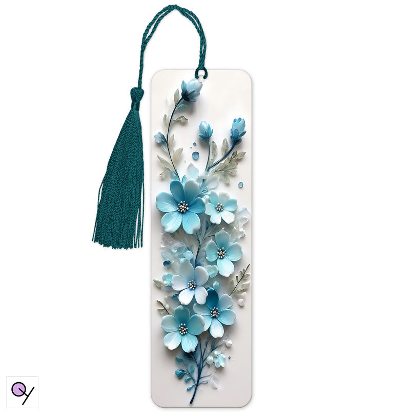 A Beautiful Blue and white 3D flower bookmark with a blue tassel on a white background.  A pretty gift.  