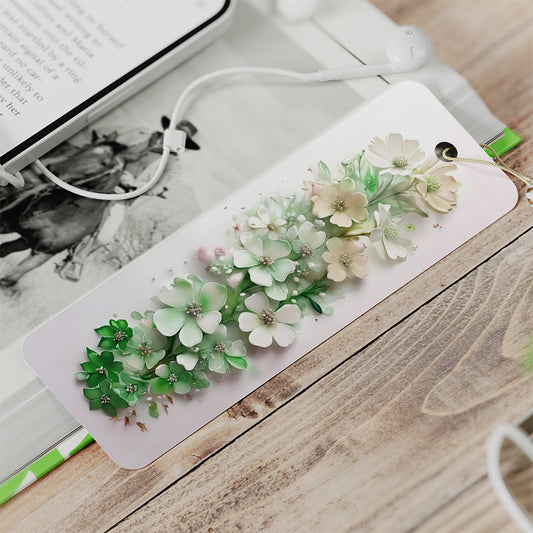 A bookmark gift with green and white 3d flowers.  Very pretty.  The bookmark as rounded corners, made of aluminium, and is modern in appearance.