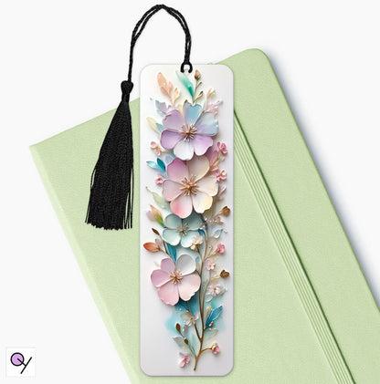 Aluminum bookmark with a stunning 3D flower effect and vibrant colors, set against a mint green diary on a white background. A beautiful gift.