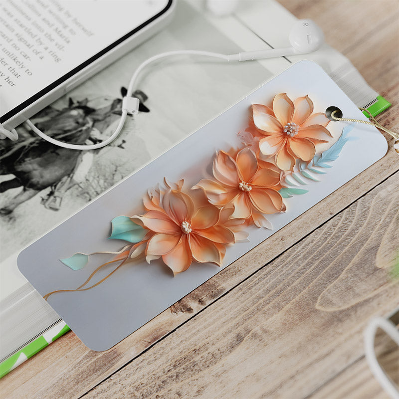 Bookmark gift with tassel.  White background with orange three dimensional flowers, very beautiful