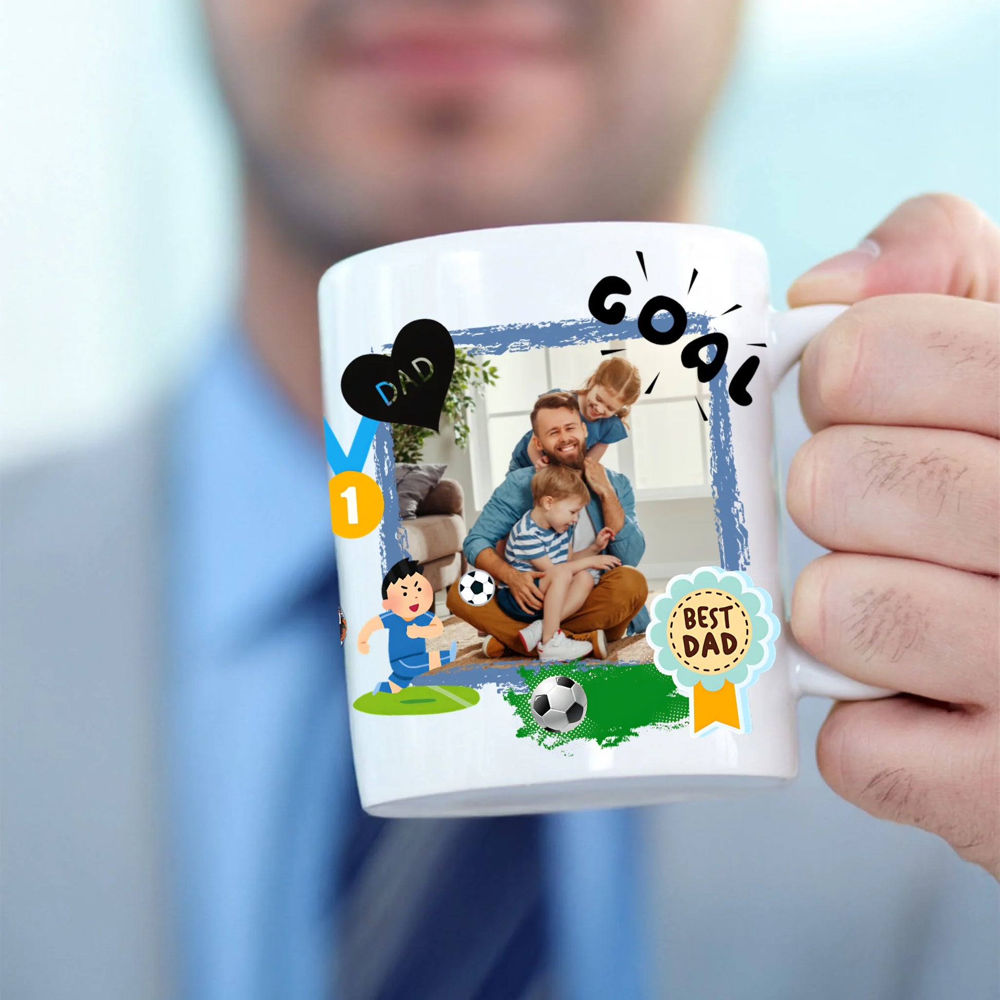 Person holding a mug with personalized designs and text, including a photo of a father and child playing soccer.