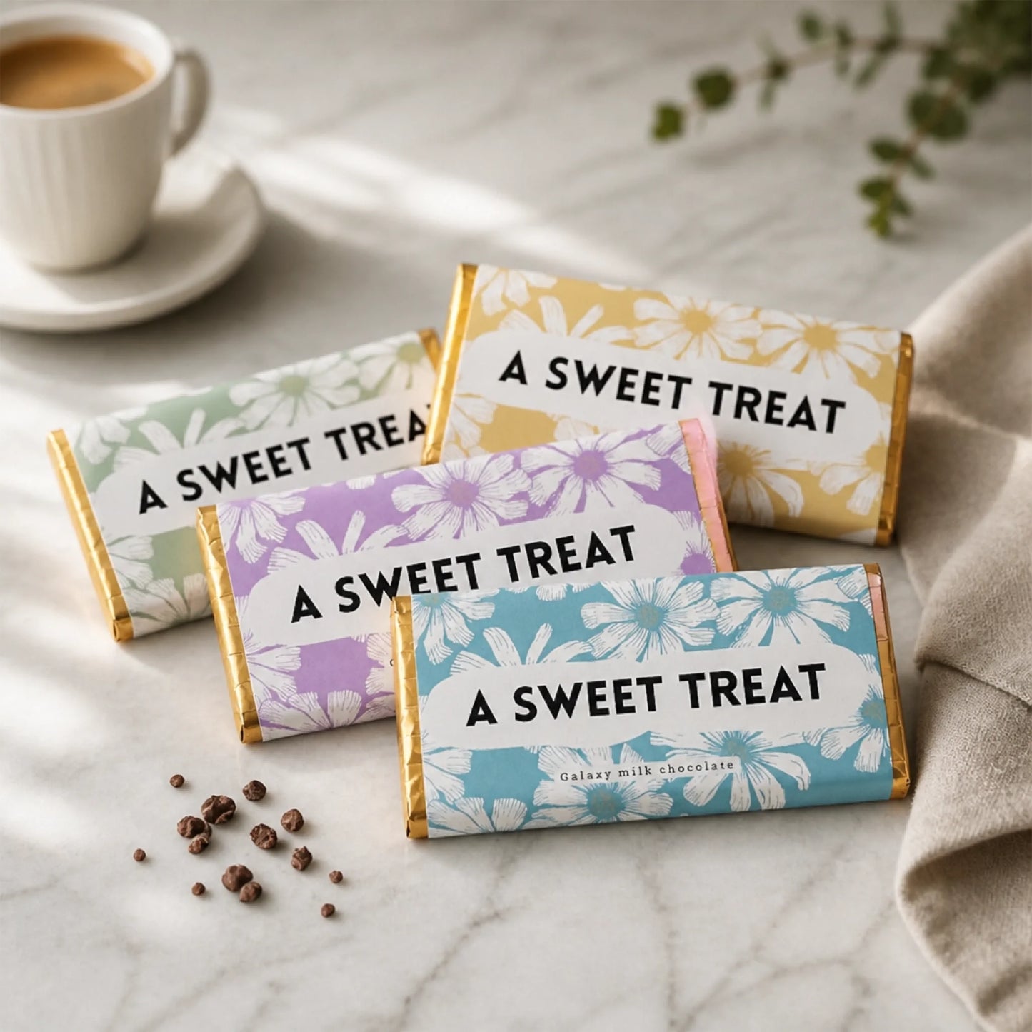 chocolates with floral wrappers saying a sweet treat