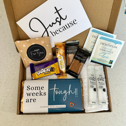 Comfort gift box UK with chocolate treats and pamper items for support