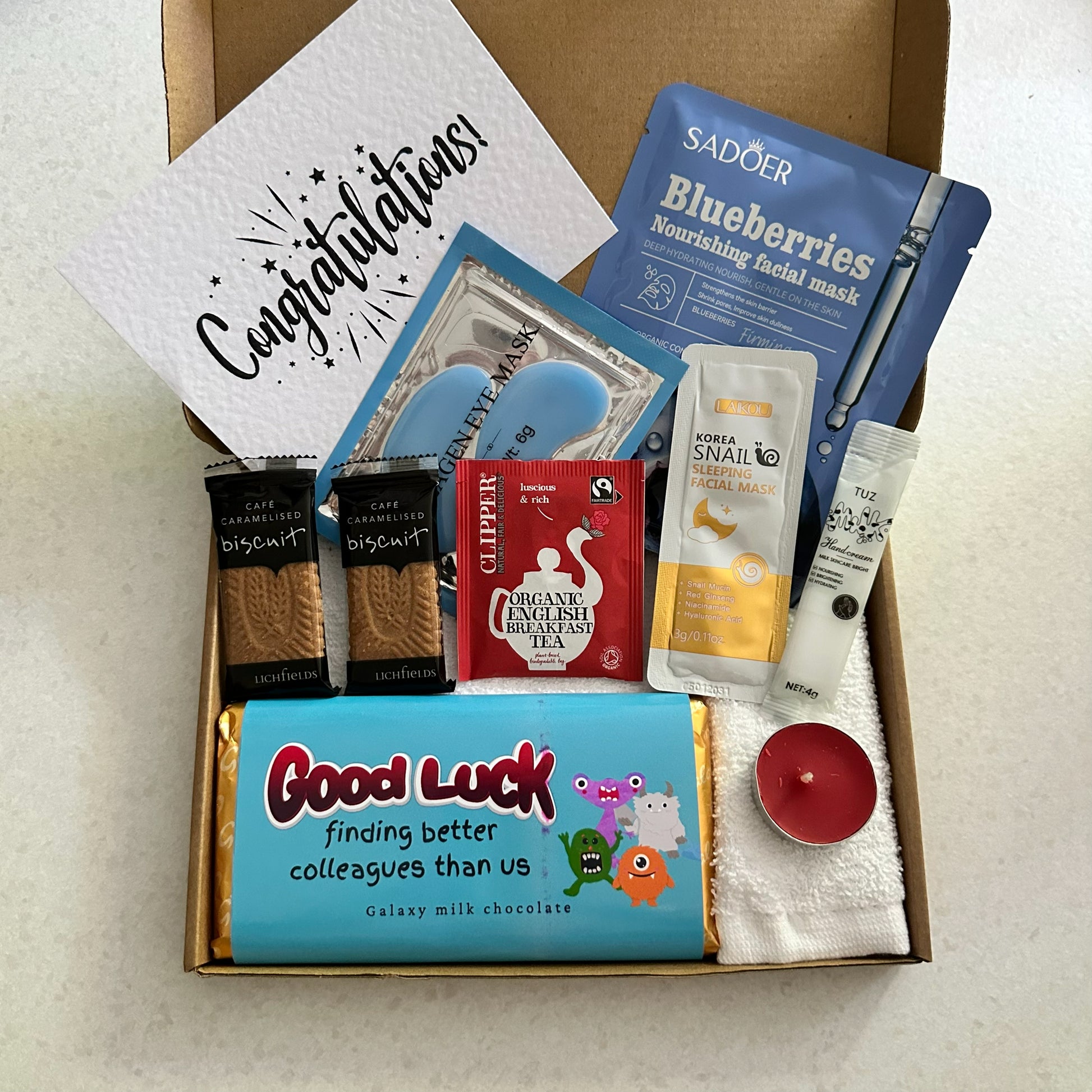 Coworker farewell gift box with chocolate and thoughtful treats