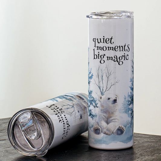 Tumbler with polar bear design and 'quiet moments big magic' text on a white background
