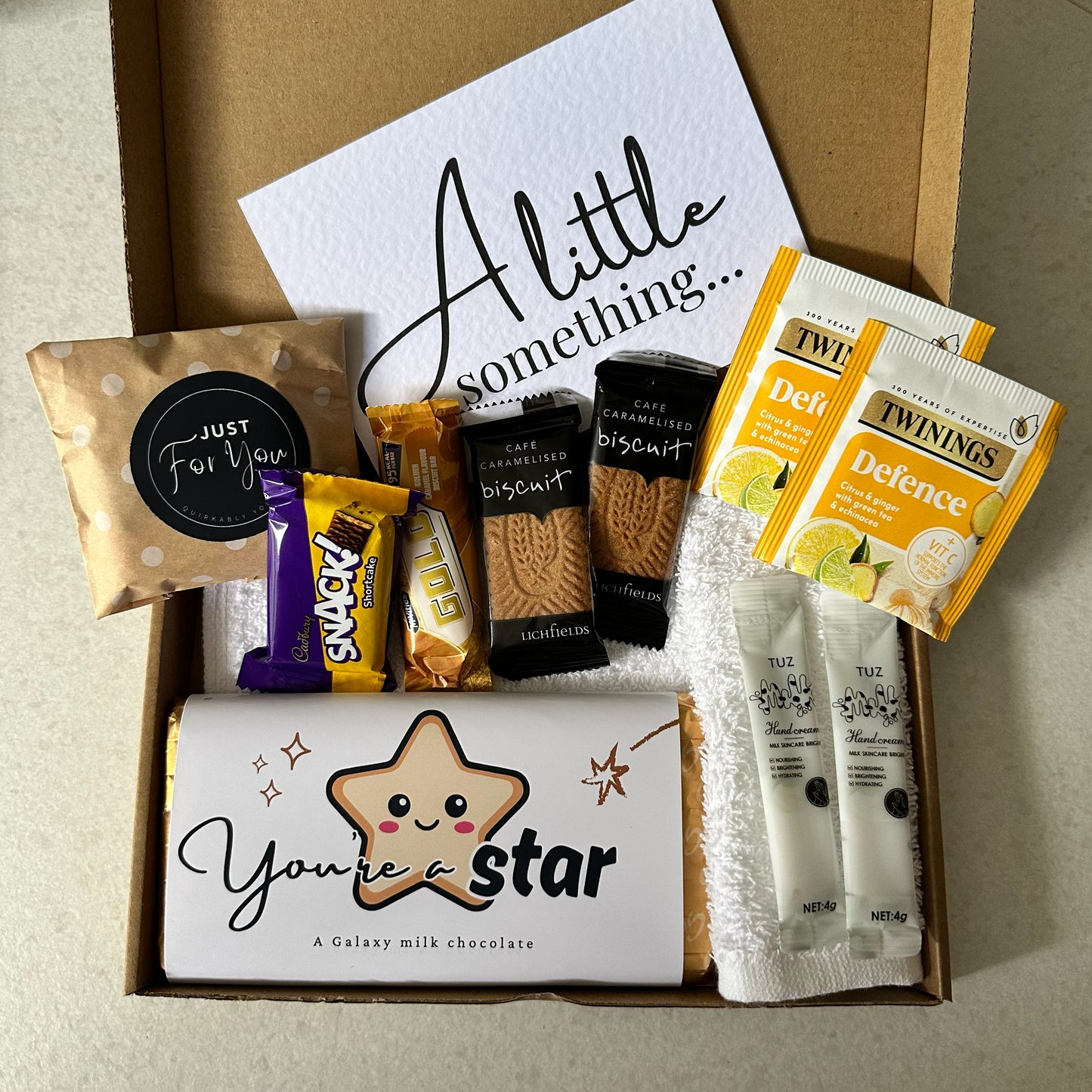 Employee of the month gift box UK with sweet treats and pamper items