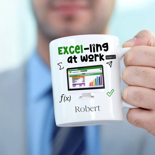 Mug with 'Excel-ing at work' design held by a Office person