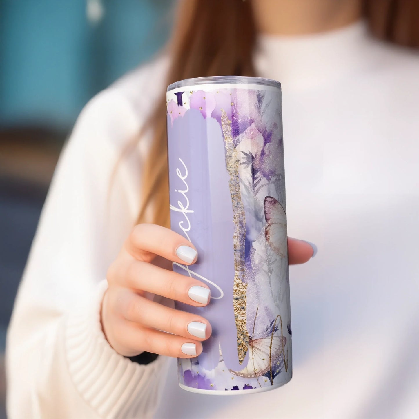"Insulated travel mug with purple floral design, perfect for gifting
