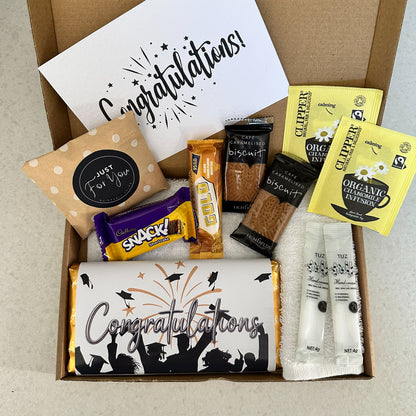 Graduation celebration gift set with treats and thoughtful keepsakes