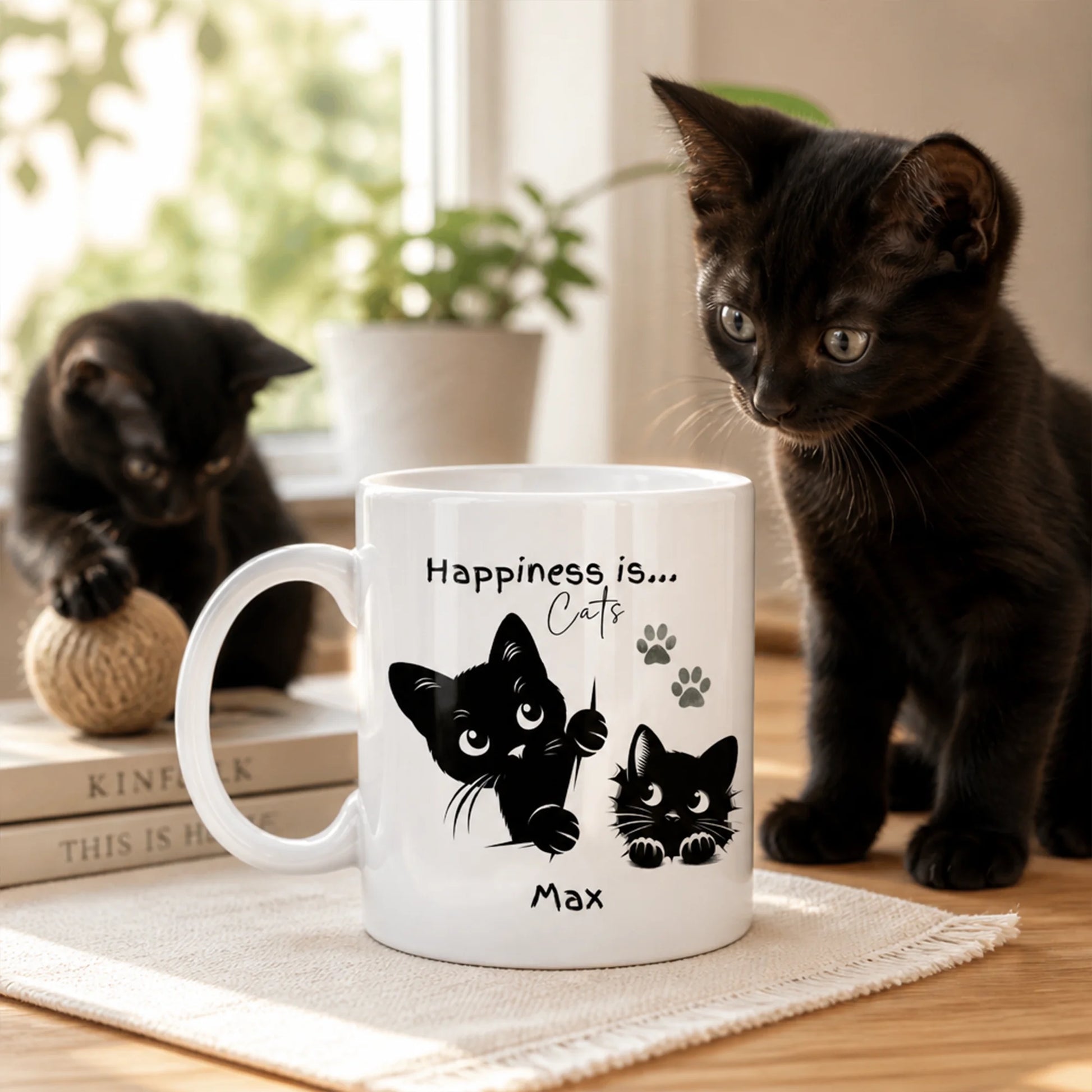 Personalised cat mug with peeking cat silhouettes and paw prints UK