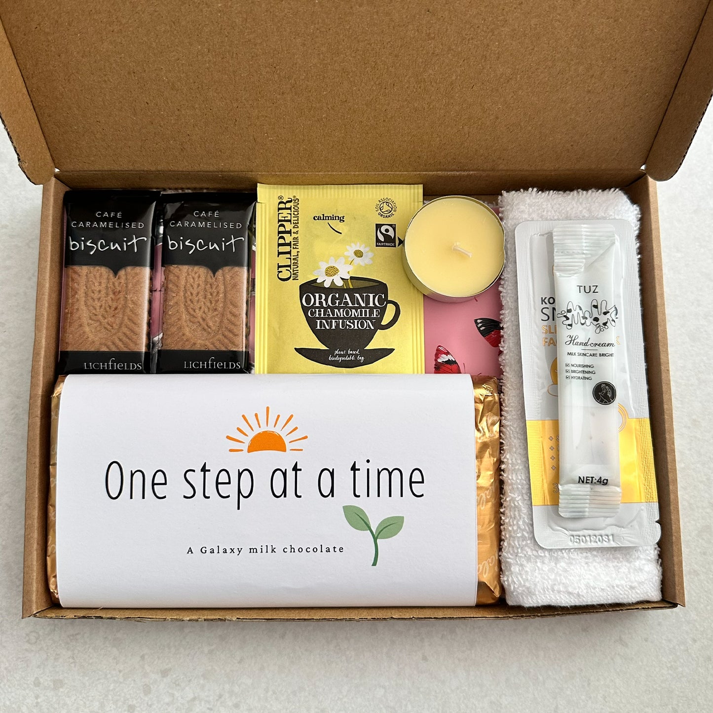 One step at a time encouragement gift box UK with chocolate and self care items