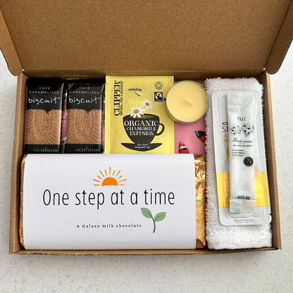 One step at a time encouragement gift box UK with chocolate and self care items