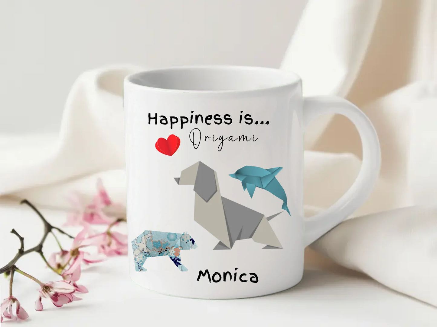 Personalised mug featuring origami dolphin