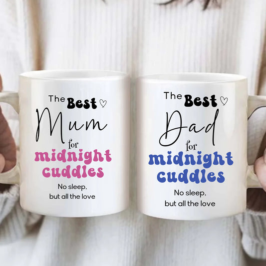 Two mugs with text 'The Best Mum for midnight cuddles' and 'The Best Dad for midnight cuddles' held by a person.