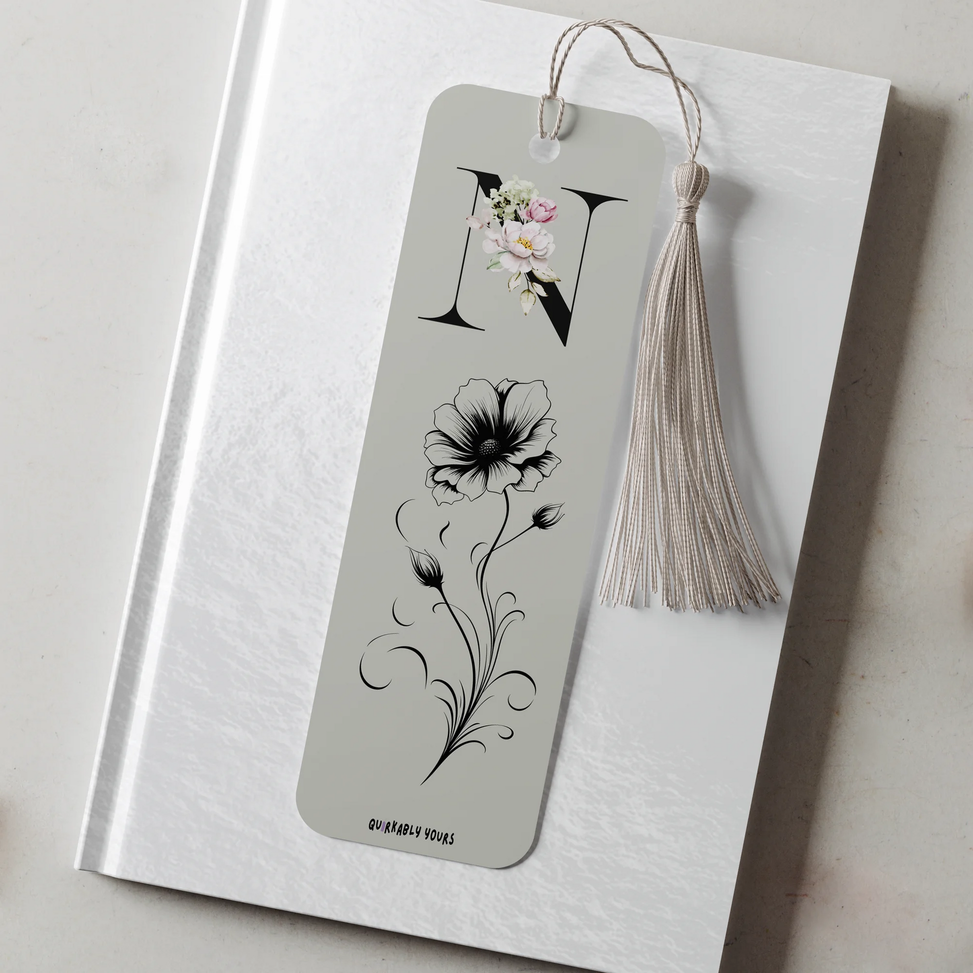 Personalised birthflower bookmark with black initial and floral design on aluminium