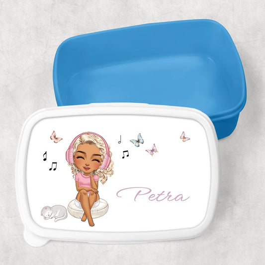 Children's lunchbox with cartoon character and 'Petra' text on a light gray background