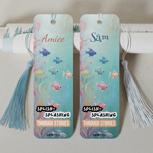 Two bookmarks with underwater-themed designs and tassels on a neutral background