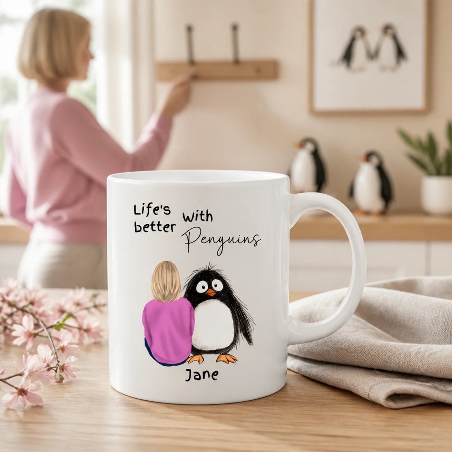 Personalised mug featuring a custom penguin character design