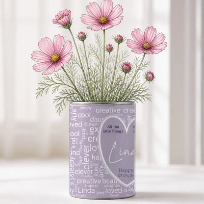Personalised word cloud grow tin with name and 25 inspiration words, filled with wildflower seeds