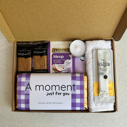 Self care gift box UK with chocolate treats and relaxing pamper items