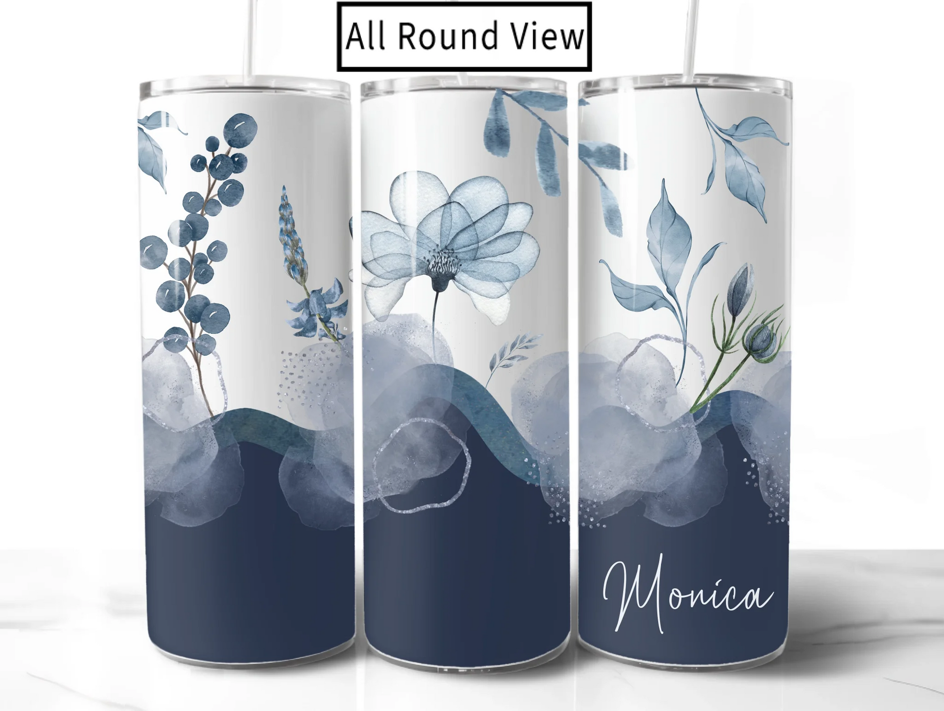 Three floral-patterned tumblers with 'Monica' on a white background